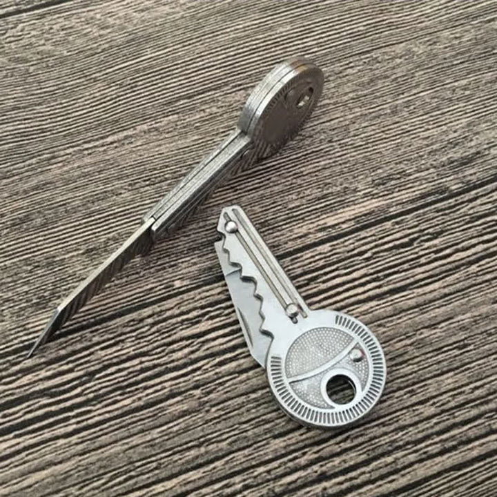 Portachiavi a forma di chiave con mini coltello pieghevole compatto