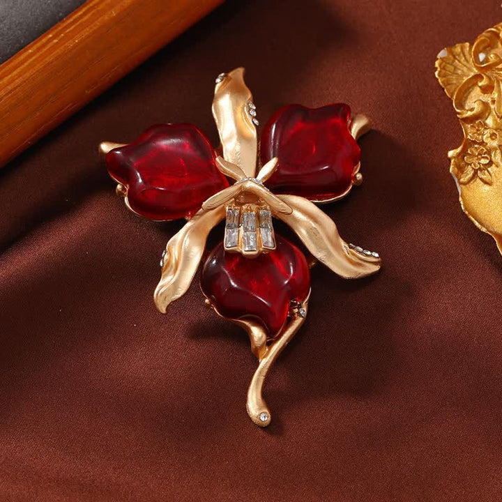 Spilla da donna in ottone metallizzato con fiore di orchidea in resina a forma di petalo