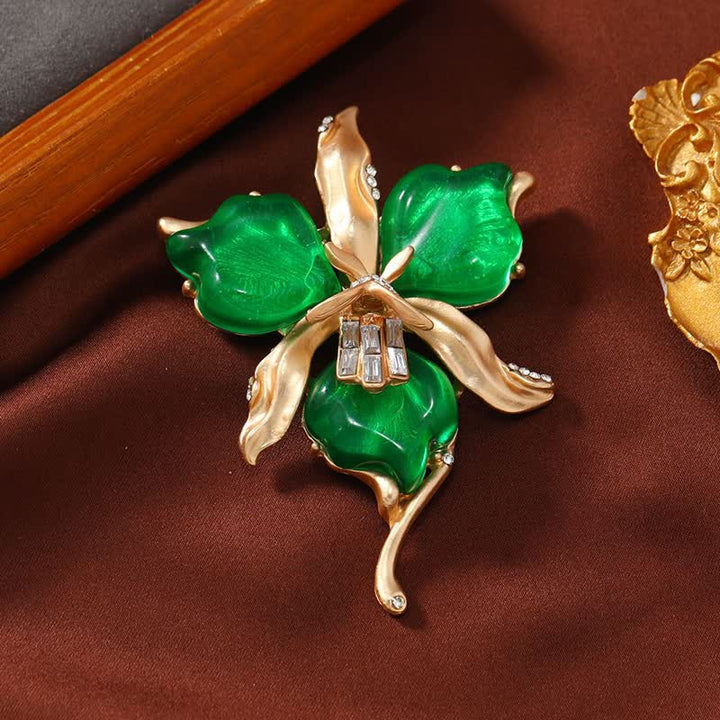 Spilla da donna in ottone metallizzato con fiore di orchidea in resina a forma di petalo