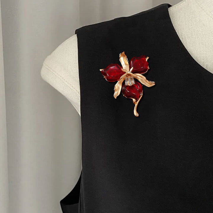 Spilla da donna in ottone metallizzato con fiore di orchidea in resina a forma di petalo