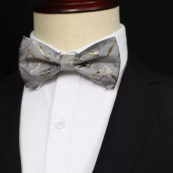 Papillon da uomo in jacquard oro delicato e senza tempo