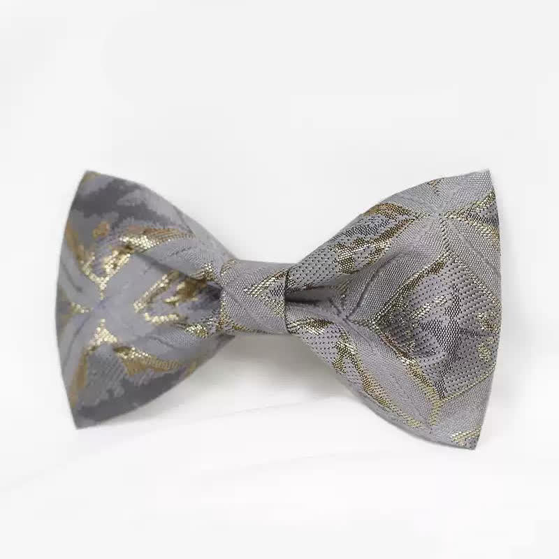 Papillon da uomo in jacquard oro delicato e senza tempo