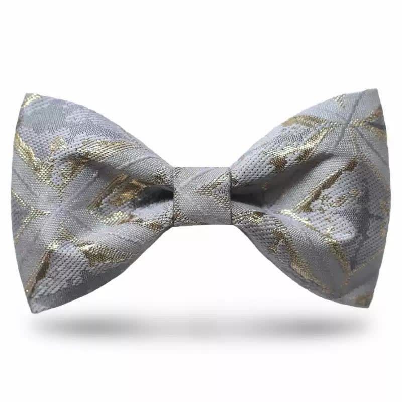 Papillon da uomo in jacquard oro delicato e senza tempo