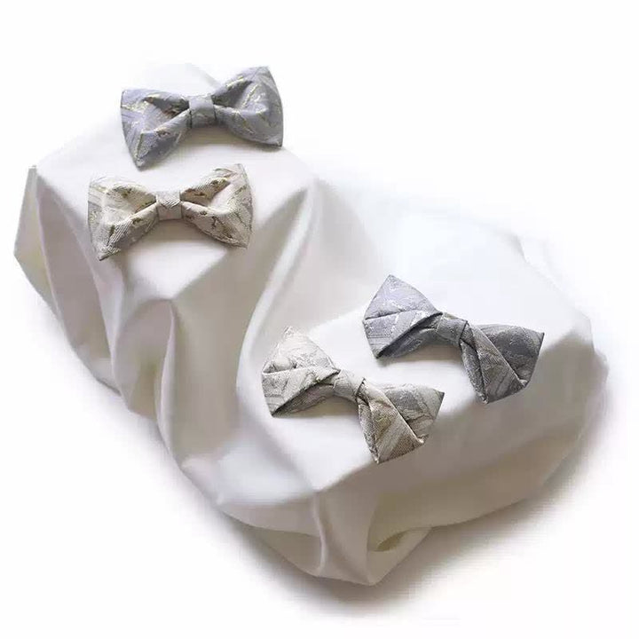 Papillon da uomo in jacquard oro delicato e senza tempo