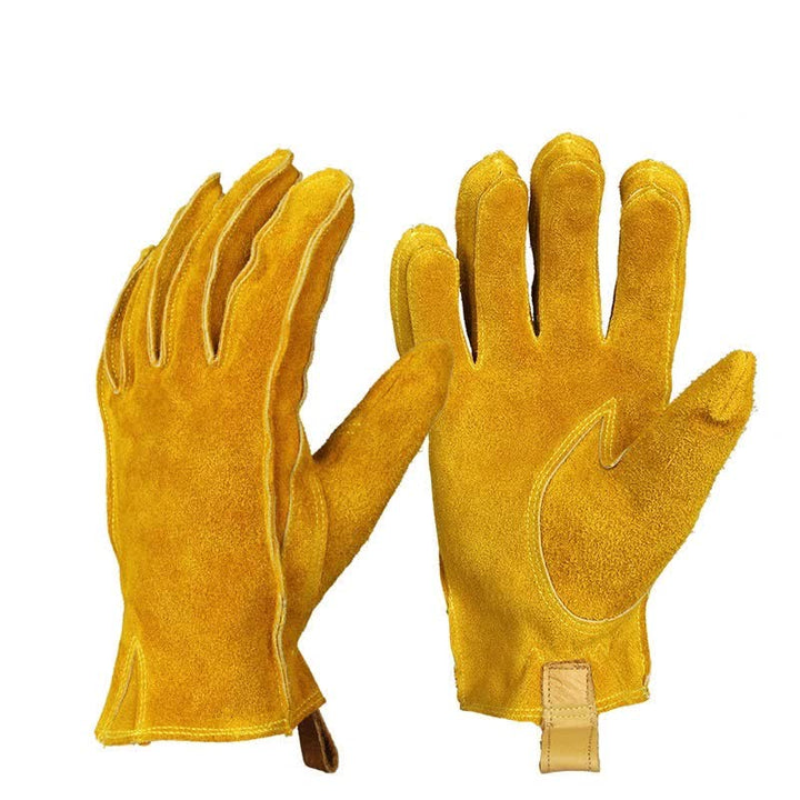 Guanti da lavoro isolati in pelle di vacchetta gialla da giardino