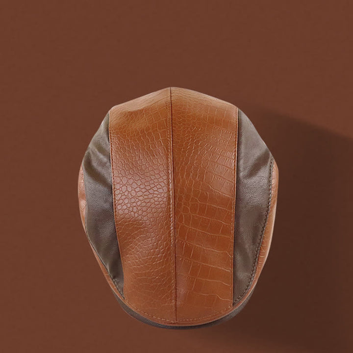 Cappello basco in pelle con cuciture vintage e stampa alligatore