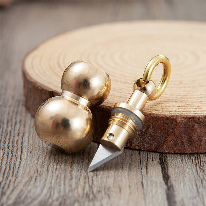 Portachiavi con coltello nascosto EDC in ottone a forma di zucca