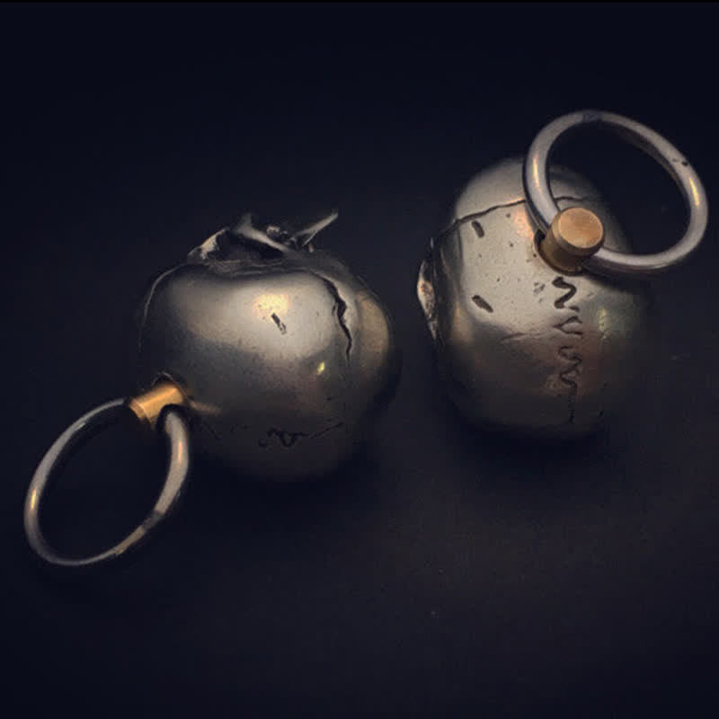 Ciondolo portachiavi girevole con testa di teschio orribile