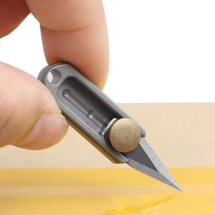 Portachiavi con lama a spinta in ottone mini EDC Tool