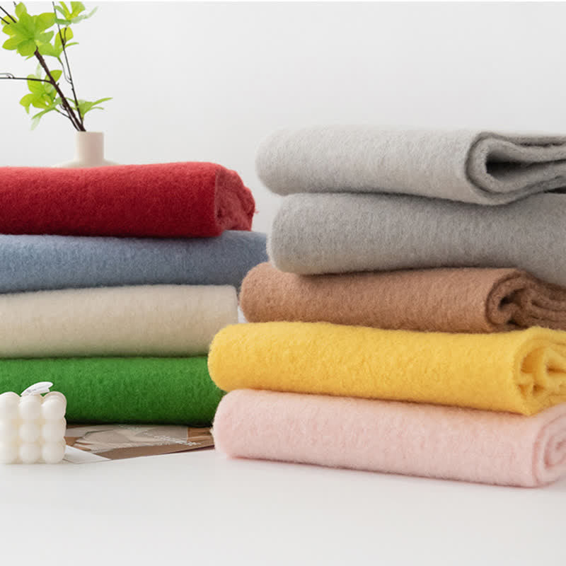 Sciarpa unisex in cashmere con frange tinta unita