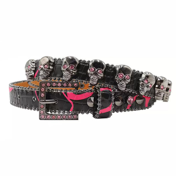 Cintura in pelle con stampa leopardata e rivetti a forma di teschio gotico