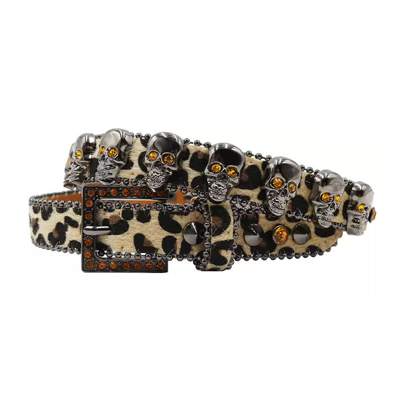 Cintura in pelle con stampa leopardata e rivetti a forma di teschio gotico