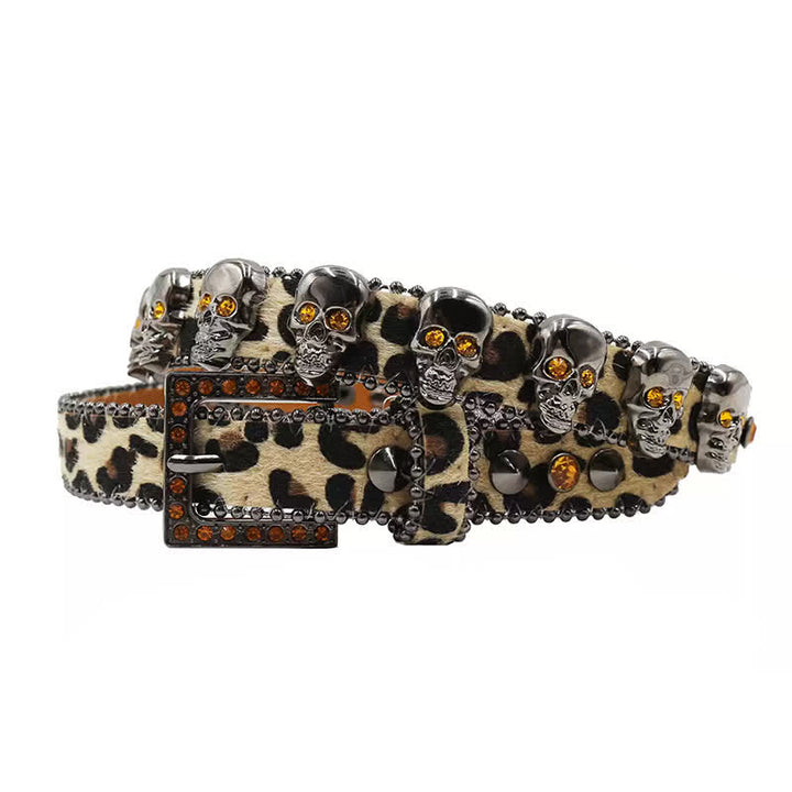 Cintura in pelle con stampa leopardata e rivetti a forma di teschio gotico