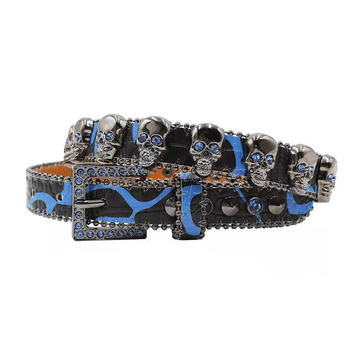 Cintura in pelle con stampa leopardata e rivetti a forma di teschio gotico