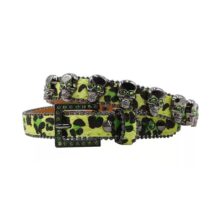 Cintura in pelle con stampa leopardata e rivetti a forma di teschio gotico