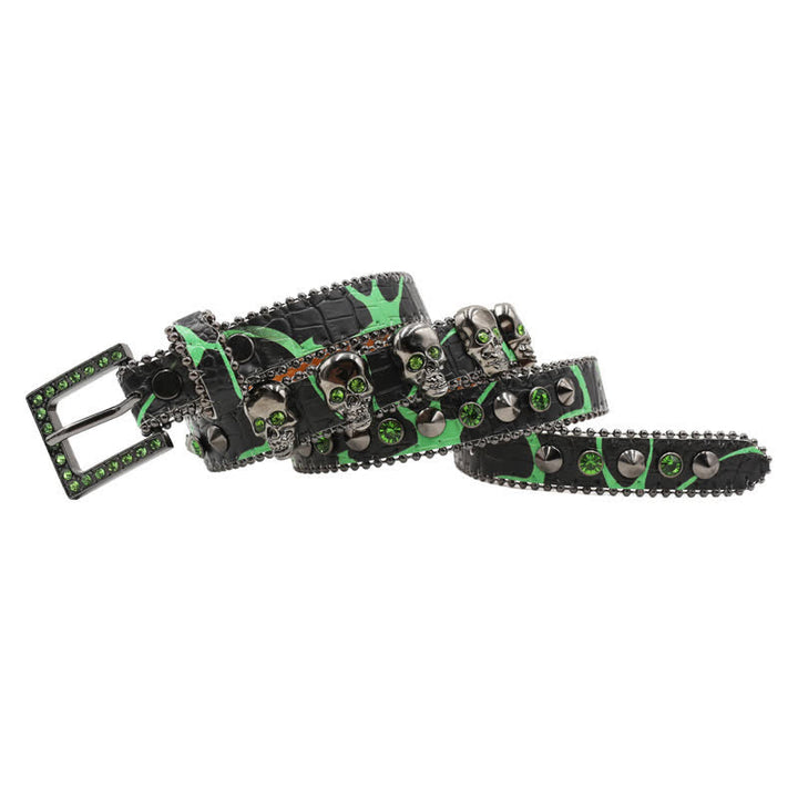 Cintura in pelle con stampa leopardata e rivetti a forma di teschio gotico