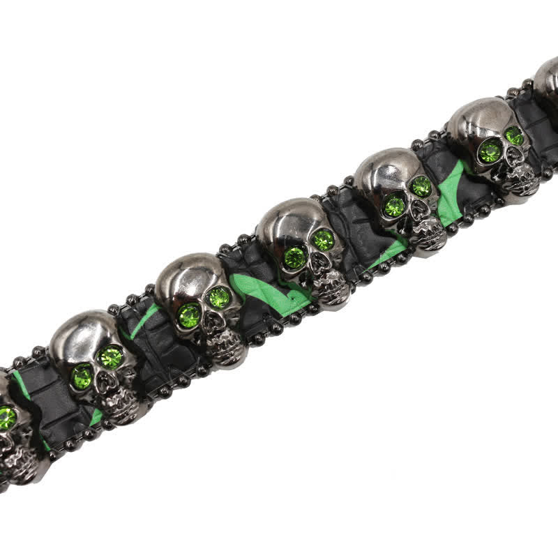 Cintura in pelle con stampa leopardata e rivetti a forma di teschio gotico