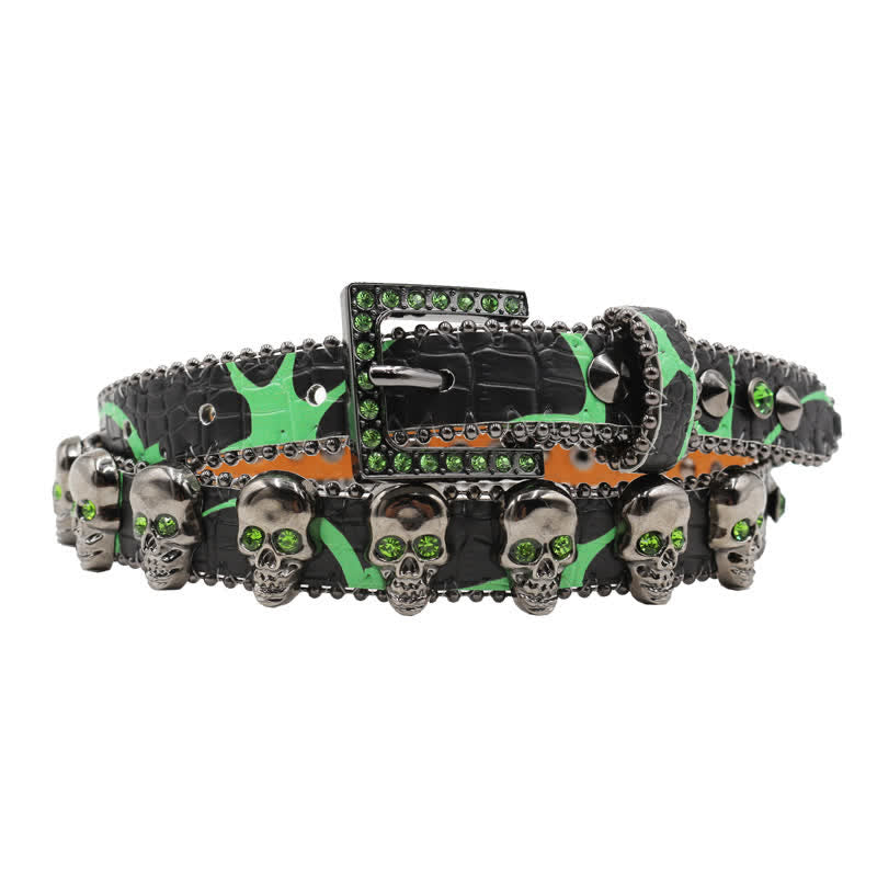 Cintura in pelle con stampa leopardata e rivetti a forma di teschio gotico