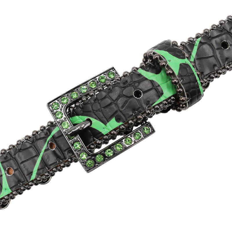 Cintura in pelle con stampa leopardata e rivetti a forma di teschio gotico