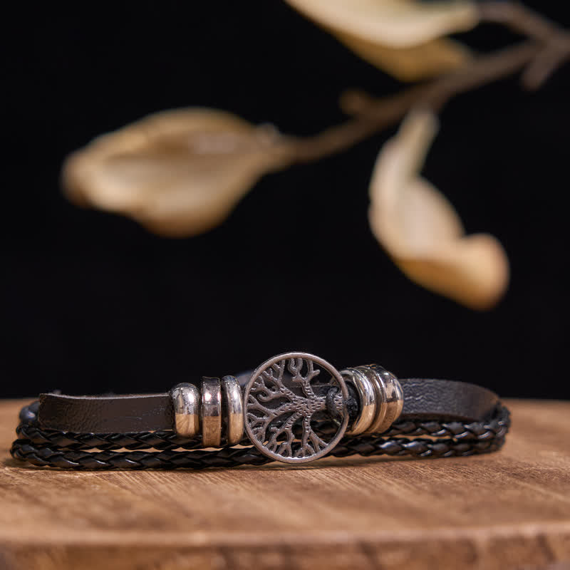 Braccialetto in pelle nera con testa di animale e teschio alla moda