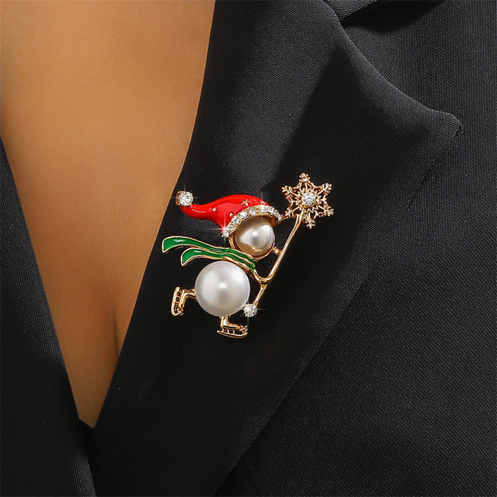 Spilla natalizia da donna con cappello di Babbo Natale rosso e pupazzo di neve - Oro e bianco - image 0