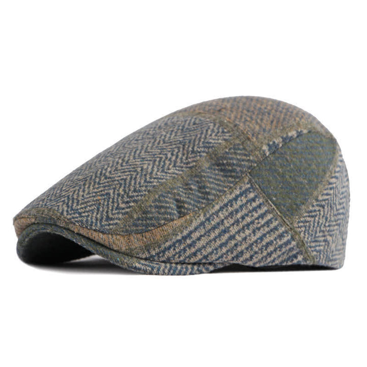 Cappello basco in tweed a spina di pesce con cuciture patchwork