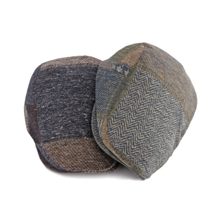 Cappello basco in tweed a spina di pesce con cuciture patchwork