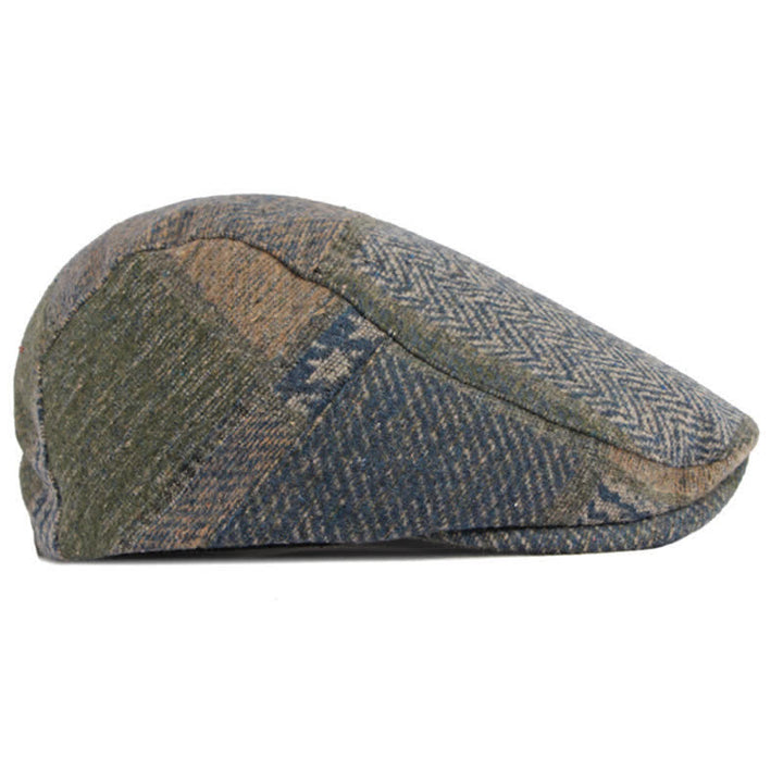 Cappello basco in tweed a spina di pesce con cuciture patchwork