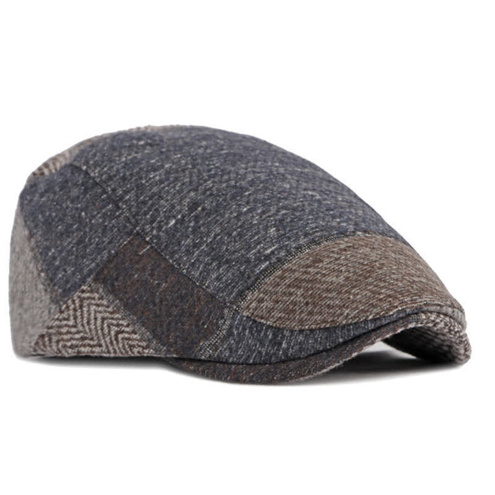 Cappello basco in tweed a spina di pesce con cuciture patchwork