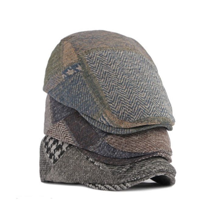Cappello basco in tweed a spina di pesce con cuciture patchwork