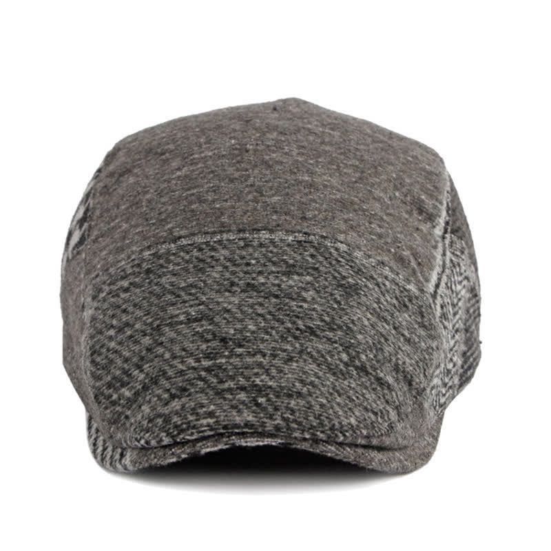 Cappello basco in tweed a spina di pesce con cuciture patchwork