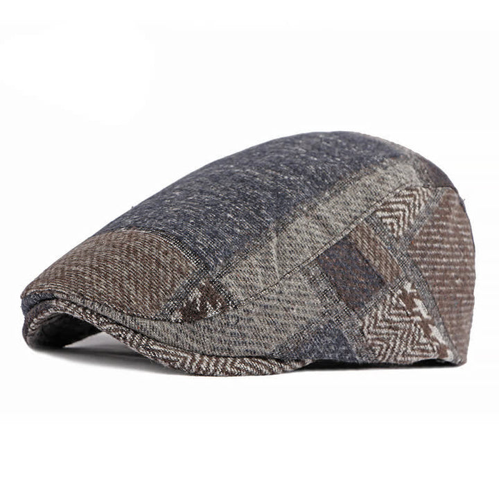 Cappello basco in tweed a spina di pesce con cuciture patchwork