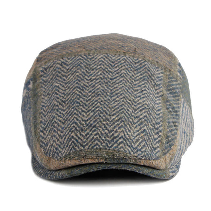 Cappello basco in tweed a spina di pesce con cuciture patchwork