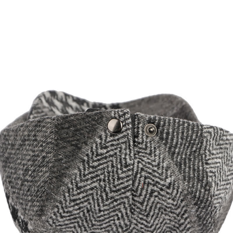 Cappello basco in tweed a spina di pesce con cuciture patchwork