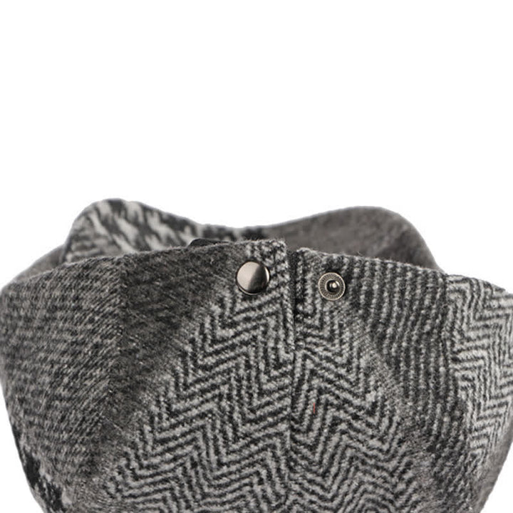 Cappello basco in tweed a spina di pesce con cuciture patchwork