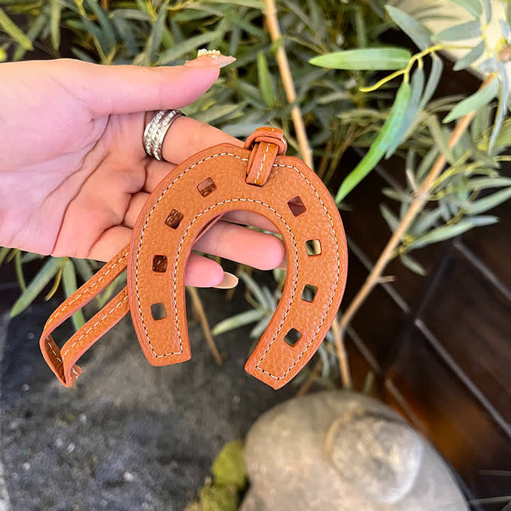 Portachiavi in pelle con ciondolo a forma di ferro di cavallo semplice