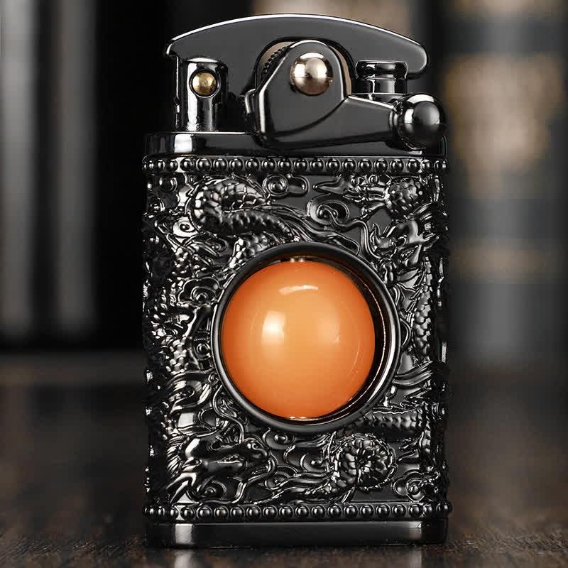 Accendino ricaricabile a butano con perlina arancione che gioca con il drago - Nero - image 1