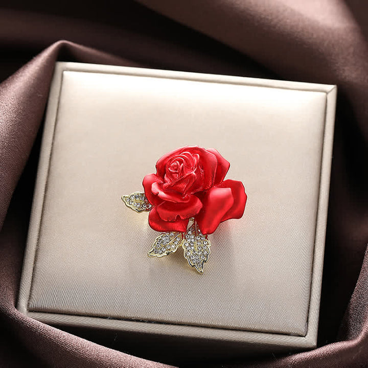 Spilla a forma di fiore con strass rosa blu rossa