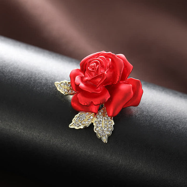 Spilla a forma di fiore con strass rosa blu rossa