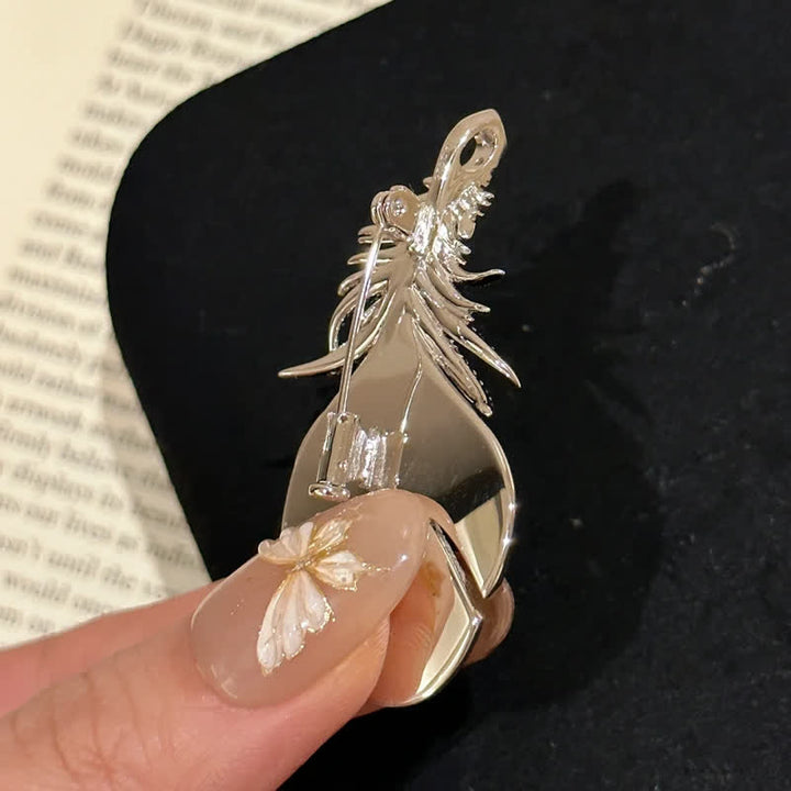 Spilla con ciondolo a forma di piuma con strass lucidi da donna