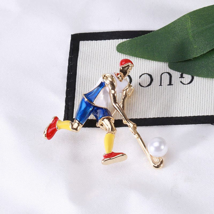 Spilla da giocatore di hockey su ghiaccio dei cartoni animati Accessori per magliette dorate