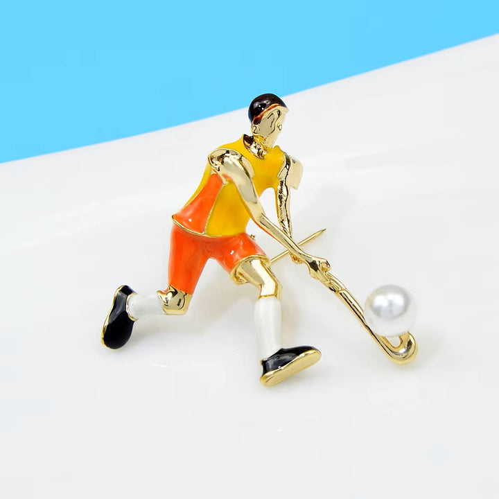 Spilla da giocatore di hockey su ghiaccio dei cartoni animati Accessori per magliette dorate