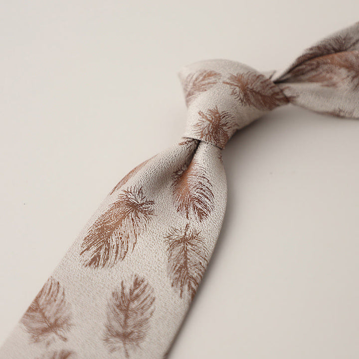 Cravatta da uomo vintage con piume svolazzanti in jacquard