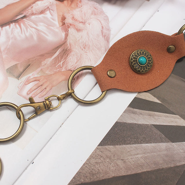 Cintura in pelle con fibbia in metallo e rivetti turchesi vintage