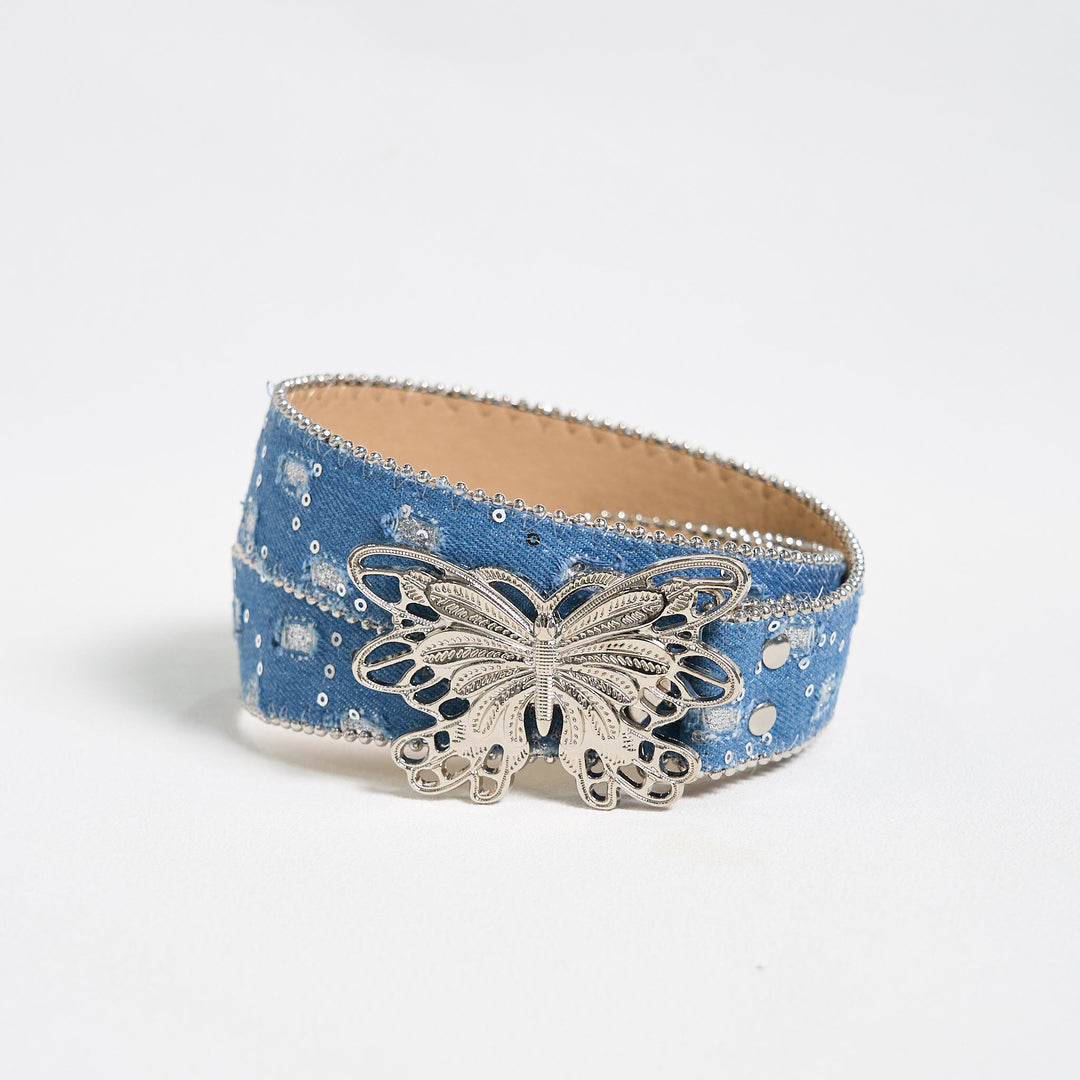Cintura in pelle con fibbia a farfalla in denim da donna