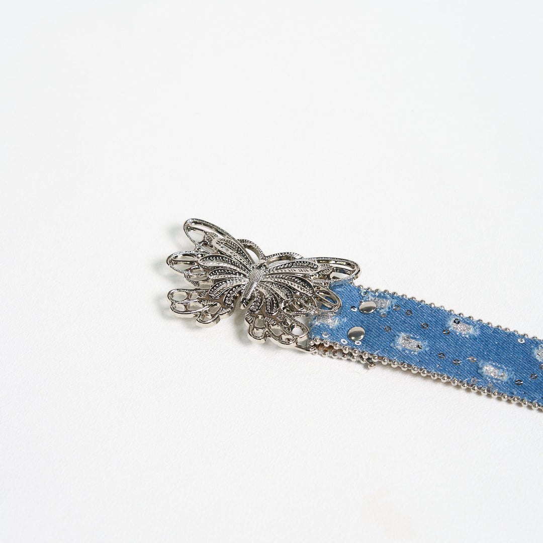 Cintura in pelle con fibbia a farfalla in denim da donna