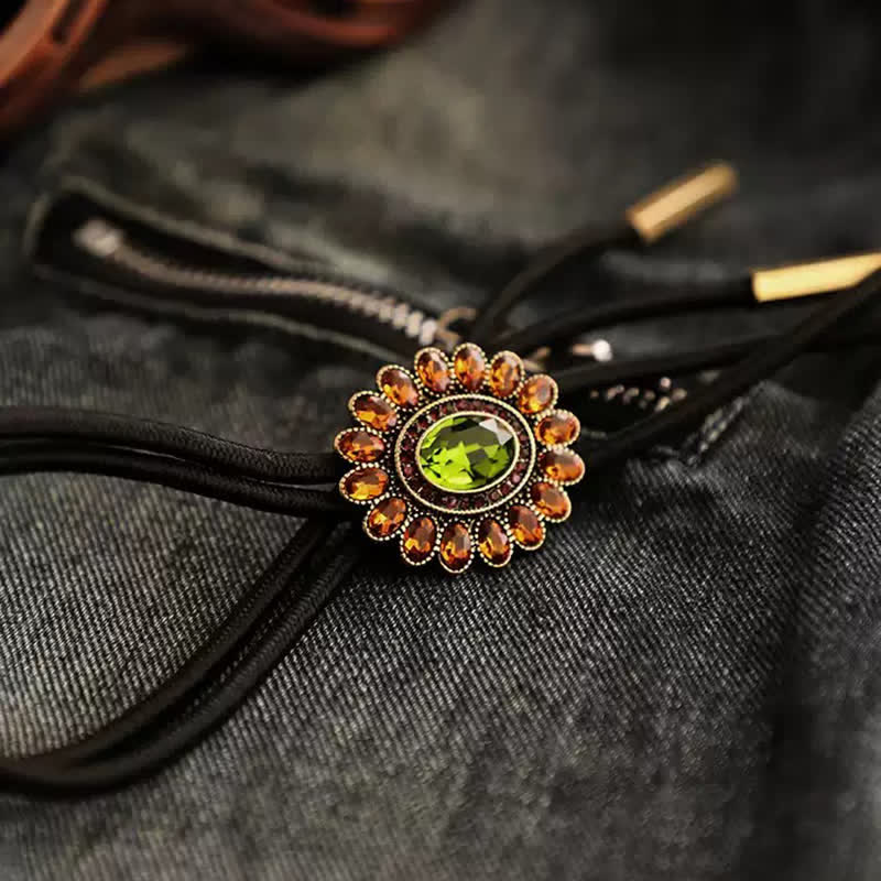 Cravatta Bolo con fiore di cristallo verde arancione solare