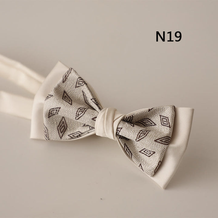 Papillon con cinturino regolabile in raso a due strati con motivo beige