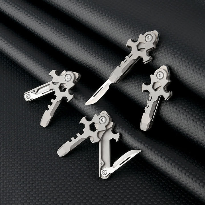 Portachiavi con mini coltello pieghevole multifunzionale in titanio Cross