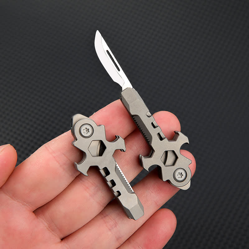 Portachiavi con mini coltello pieghevole multifunzionale in titanio Cross